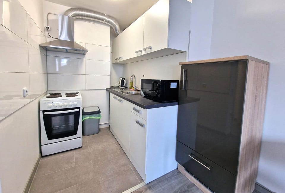 Kitchen or kitchenette, oven, stove