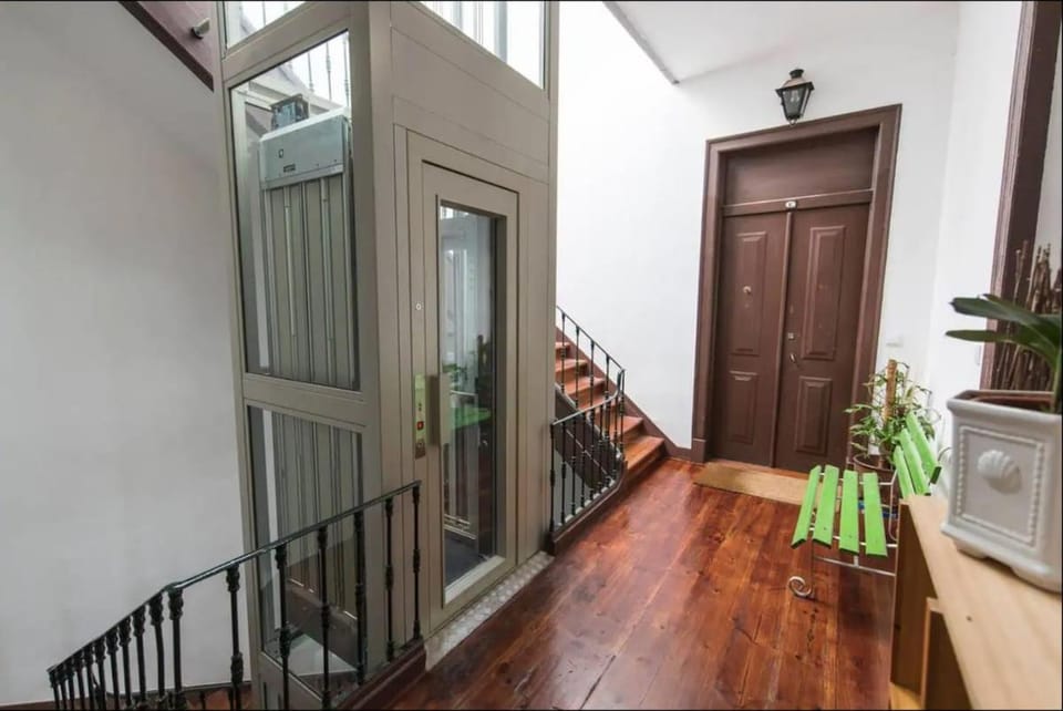 Property building, elevator