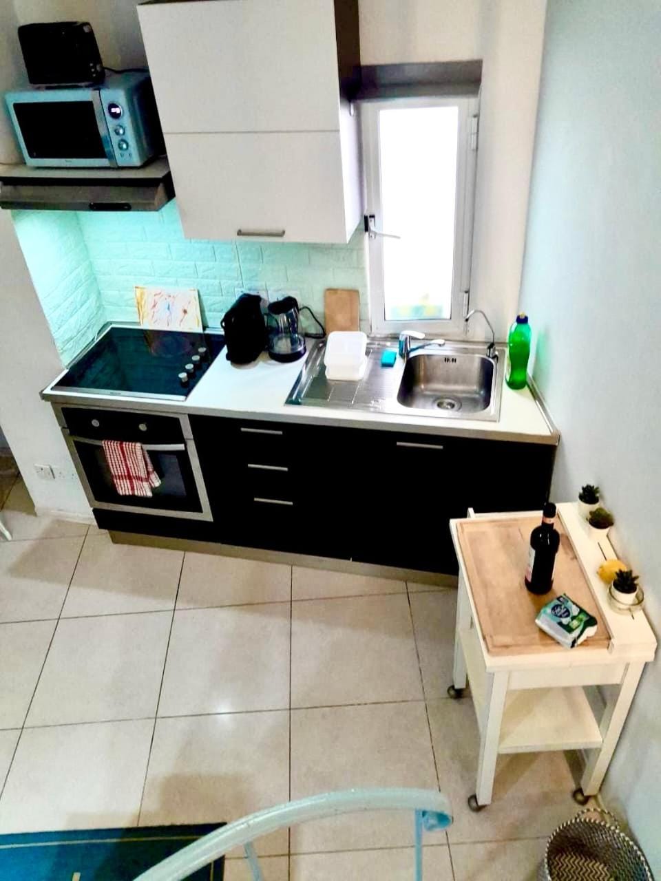 Kitchen or kitchenette, oven, stove, toaster