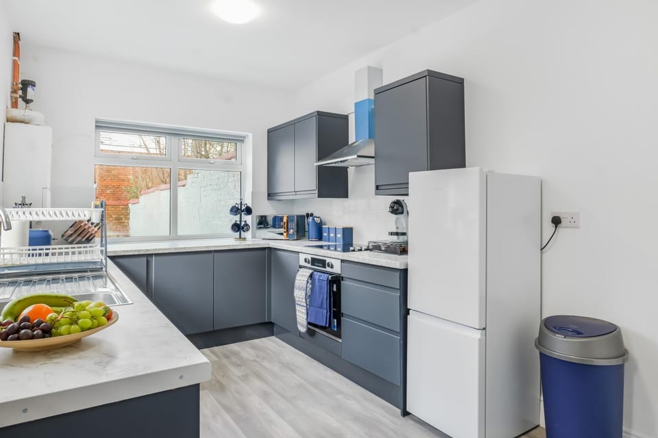 Kitchen or kitchenette, oven, toaster