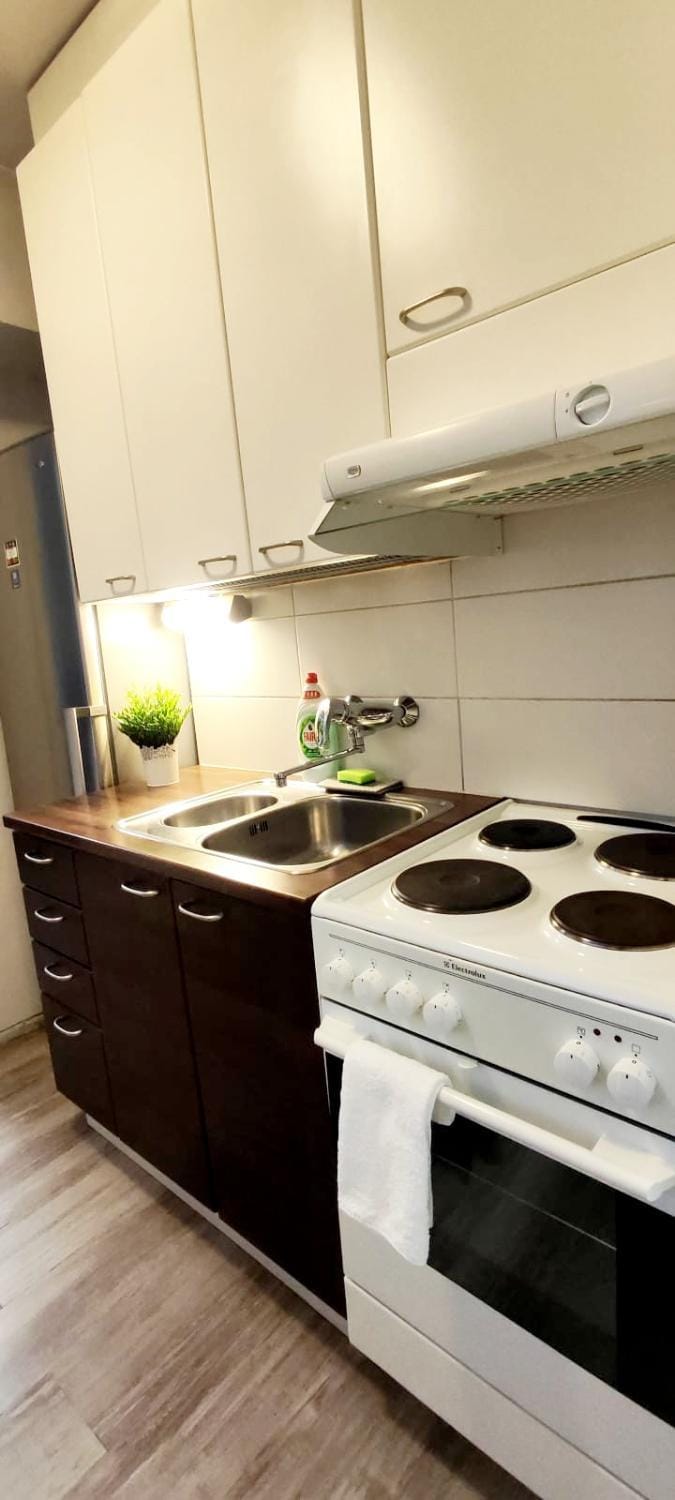 Kitchen or kitchenette, stove