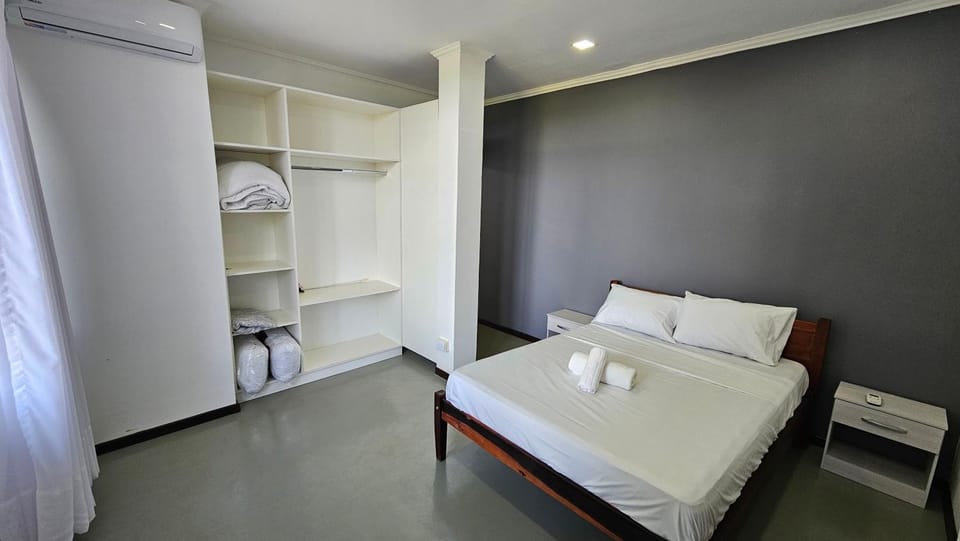Bed, Photo of the whole room, Bedroom, towels, wardrobe, air conditioner