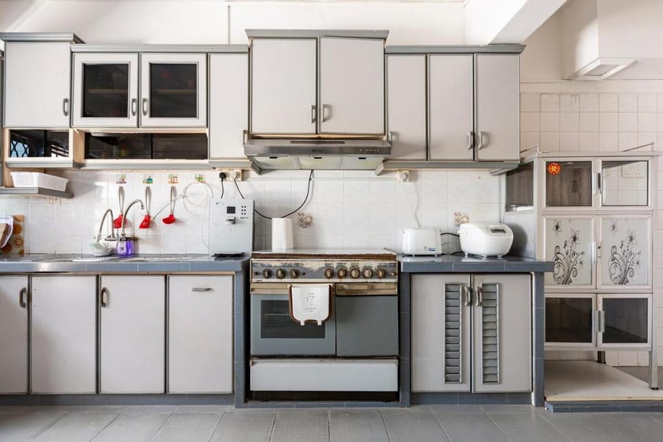 Kitchen or kitchenette, oven, stove, toaster
