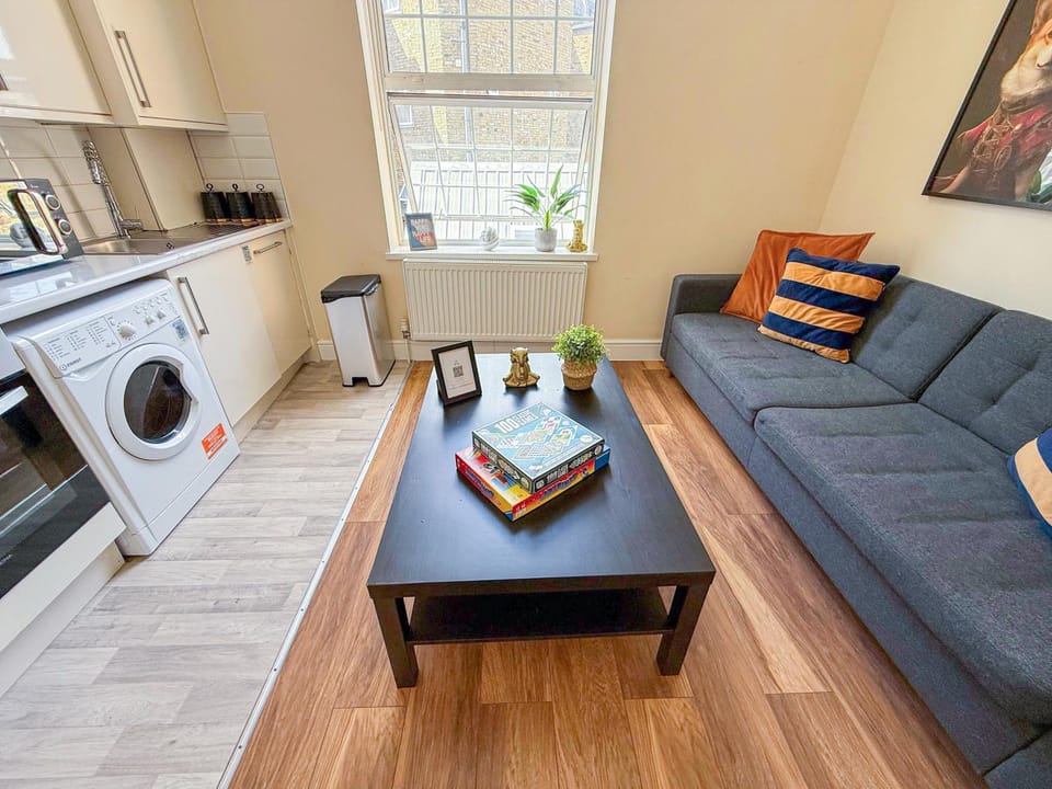 View (from property/room), Kitchen or kitchenette, Living room, Decorative detail, Seating area, washing machine, dryer