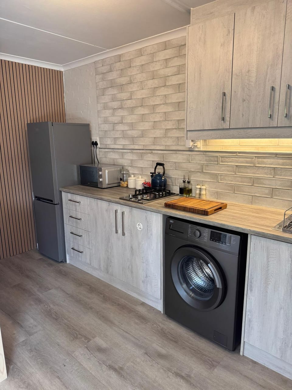 Coffee/tea facilities, Kitchen or kitchenette, stove, washing machine
