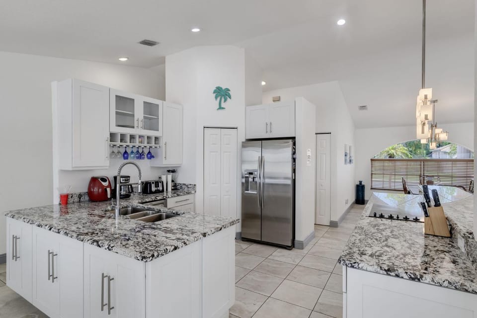 Gorgeous 4BR Lakefront Villa with Heated Pool House in Lee County