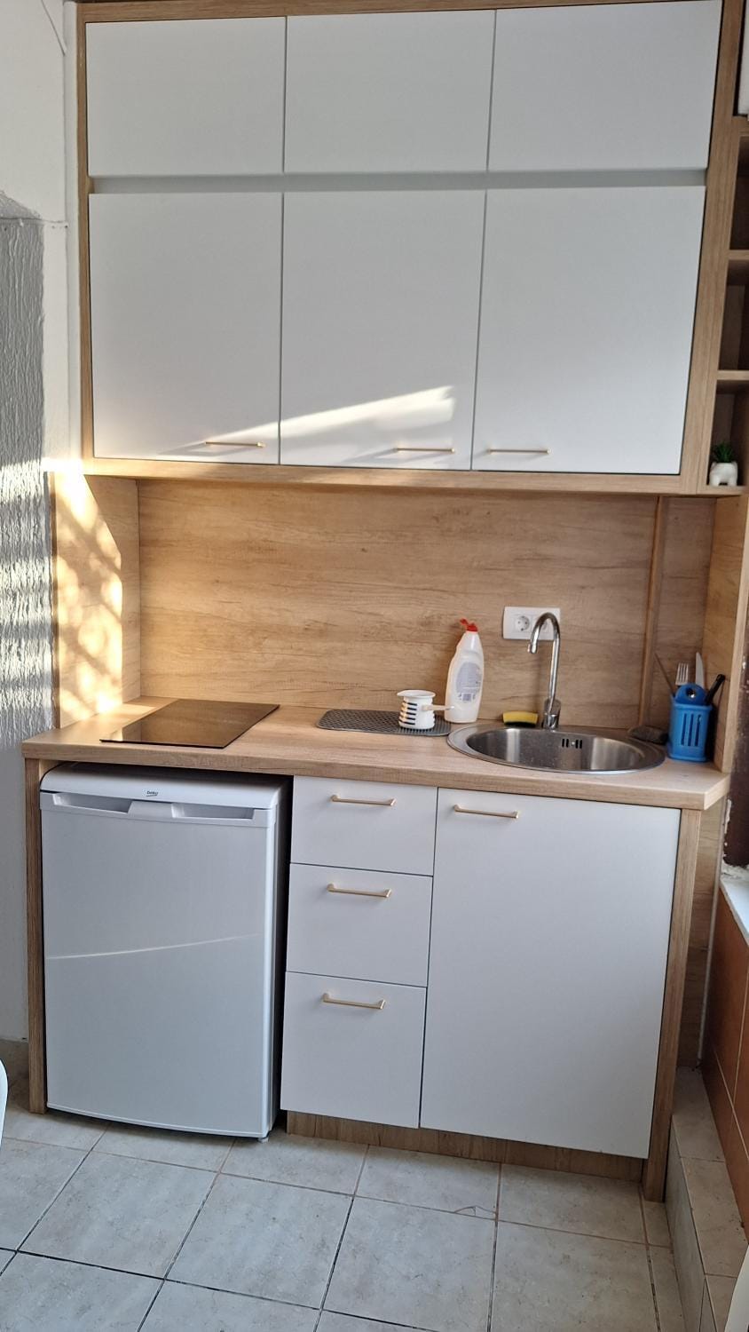 Kitchen or kitchenette, stove