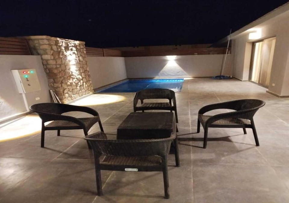 Living room, Seating area, Dining area, Swimming pool
