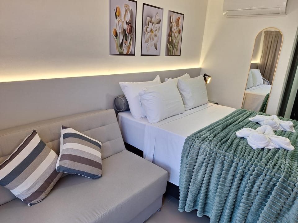 Bed, Photo of the whole room, Bedroom, towels, air conditioner