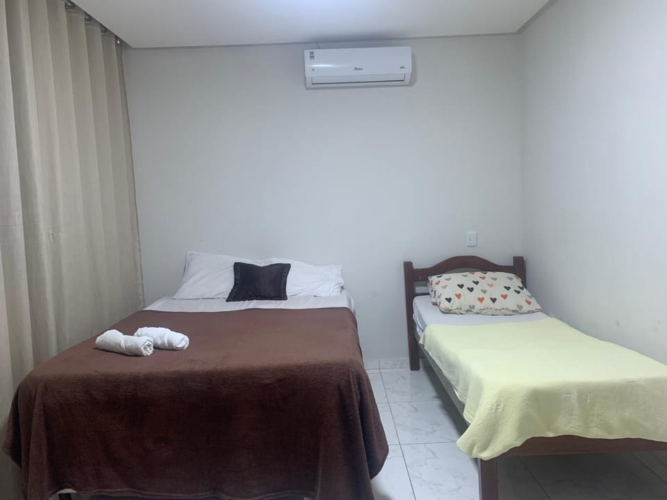 Bed, Photo of the whole room, Bedroom, towels, air conditioner