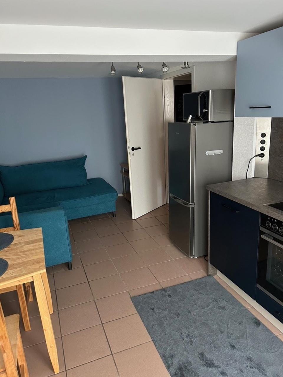 Kitchen or kitchenette, Living room, Seating area, Dining area