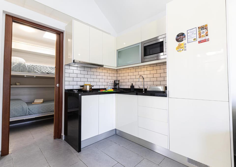 Kitchen or kitchenette, stove, kitchen