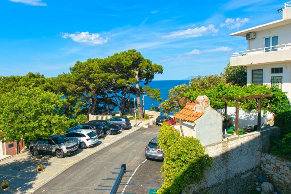 Neighbourhood, Natural landscape, Sea view, Street view, Parking
