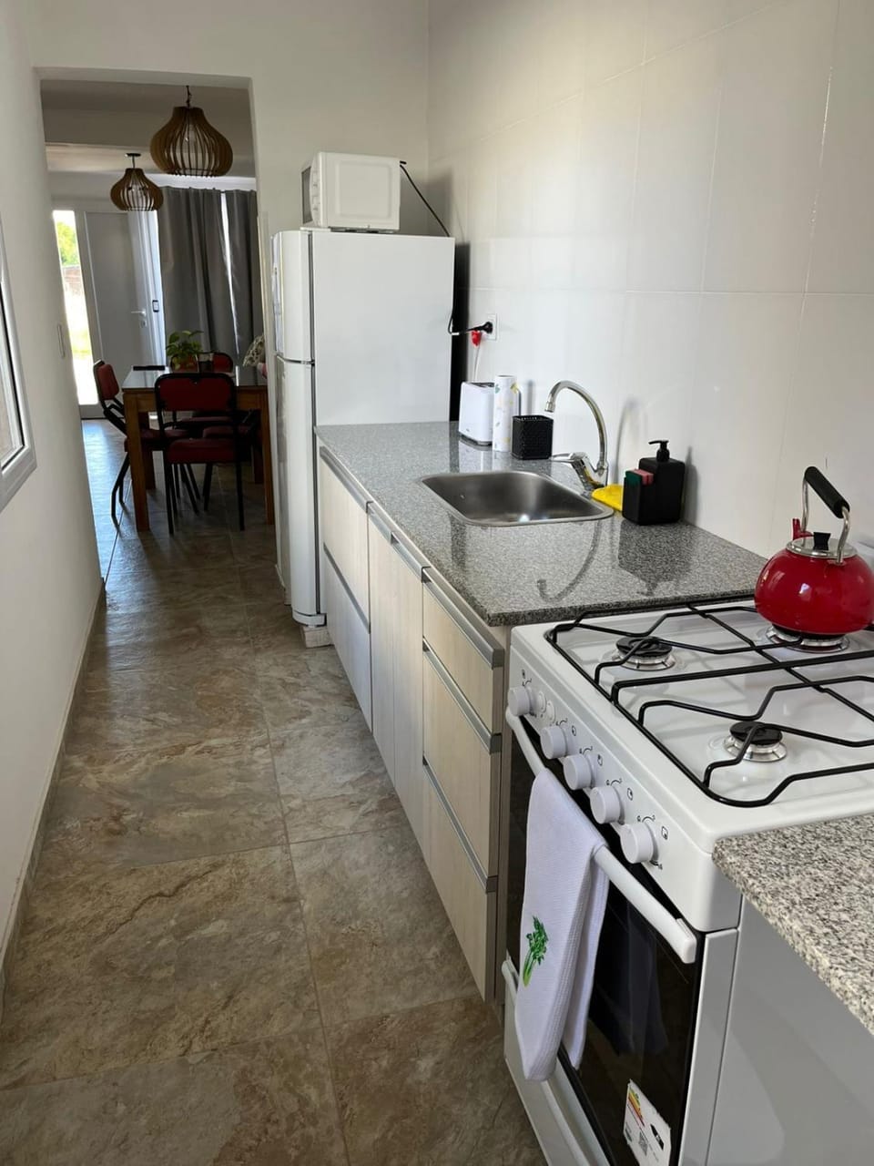 Kitchen or kitchenette, oven, stove, toaster