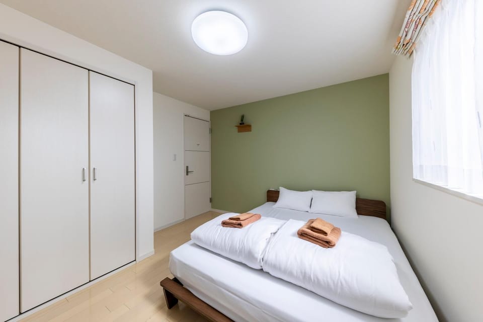 Bed, Photo of the whole room, Bedroom, towels, wardrobe