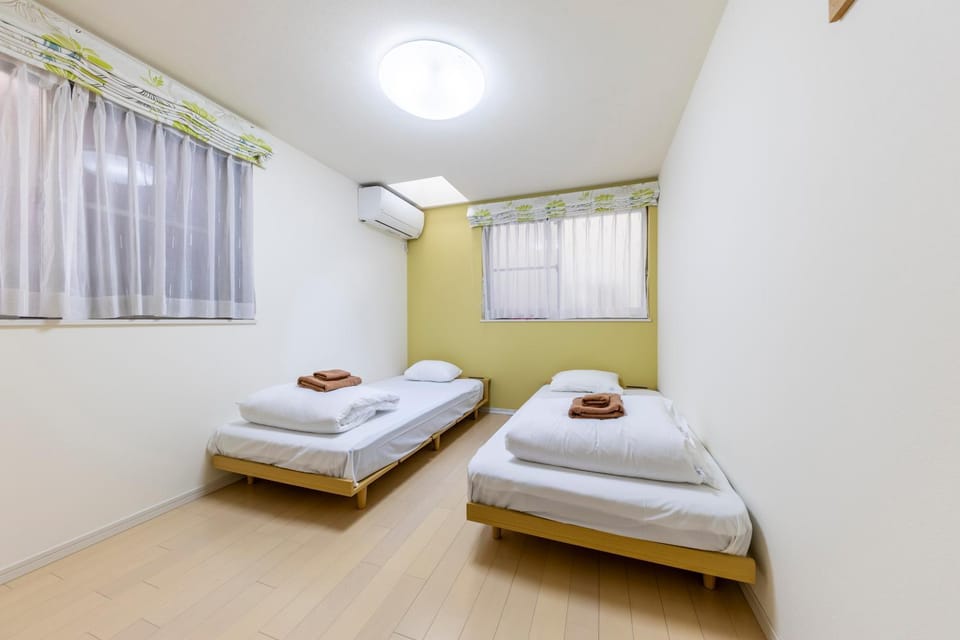 Bed, Photo of the whole room, Bedroom, towels, air conditioner