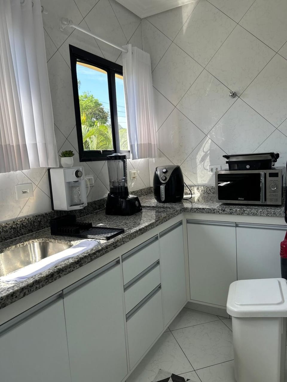Kitchen or kitchenette, stove, toaster