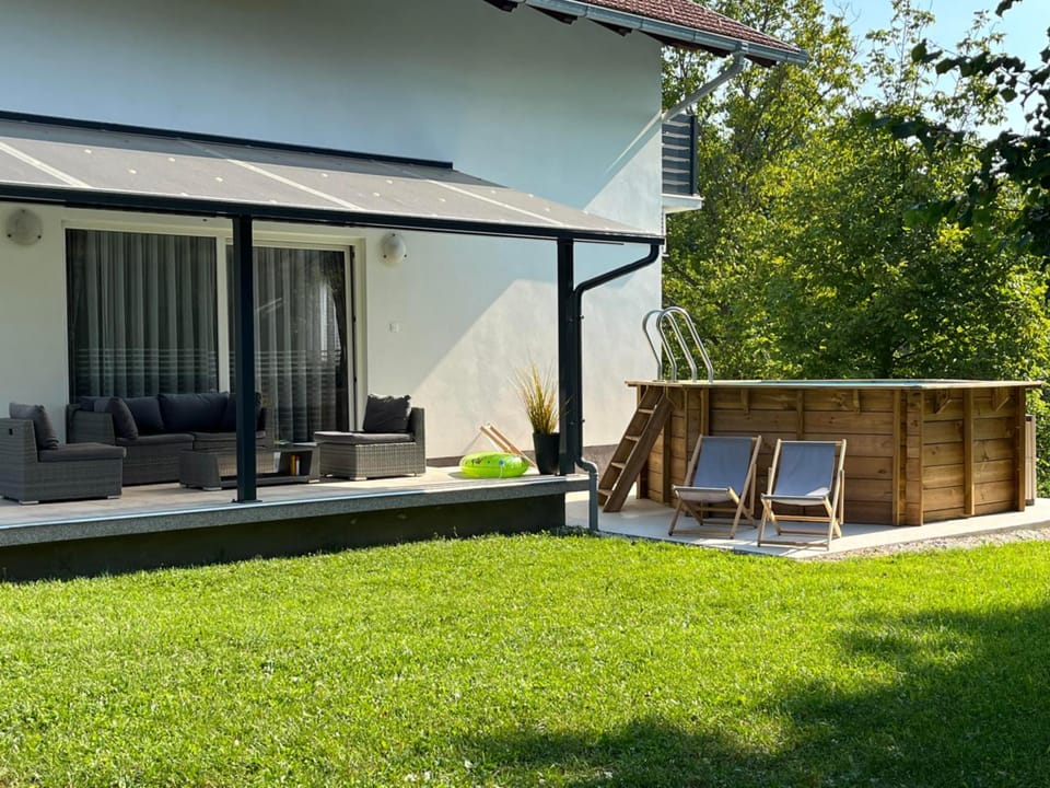 Property building, Patio, Spring, Day, Garden, Garden view, Swimming pool, sunbed