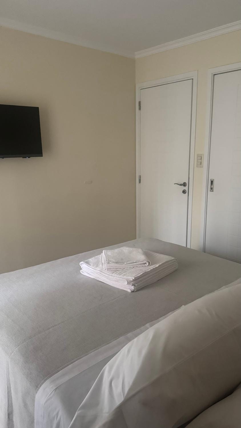 Bed, TV and multimedia, Bedroom, towels, wardrobe