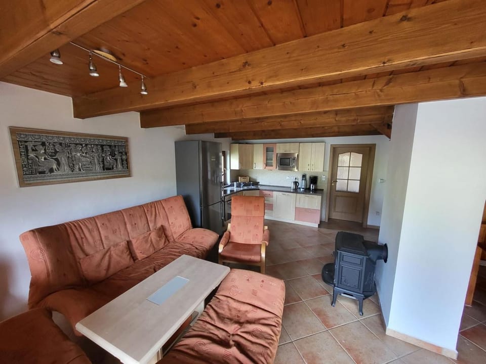 Kitchen or kitchenette, Living room, Seating area, Dining area