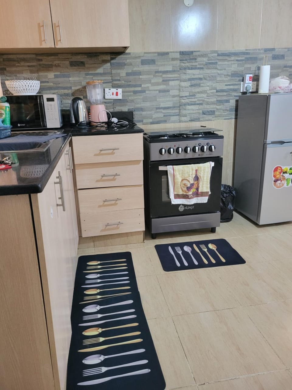 Kitchen or kitchenette, oven