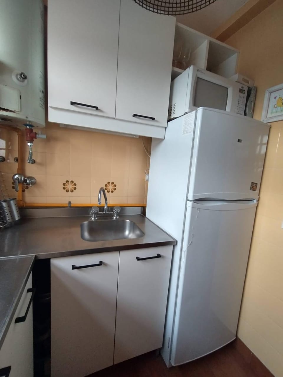 Kitchen or kitchenette, oven