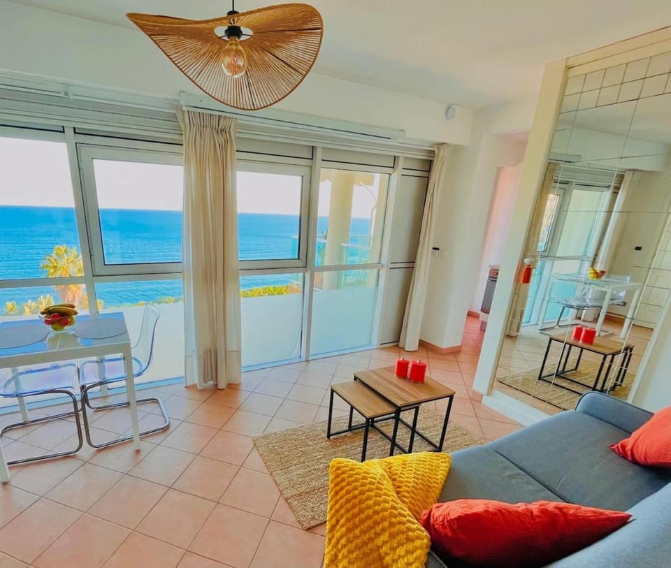 Natural landscape, View (from property/room), Living room, Seating area, Dining area, Sea view