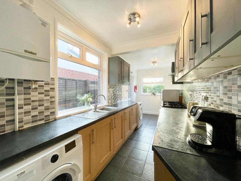 microwave, toaster, washing machine, kitchen, kitchen