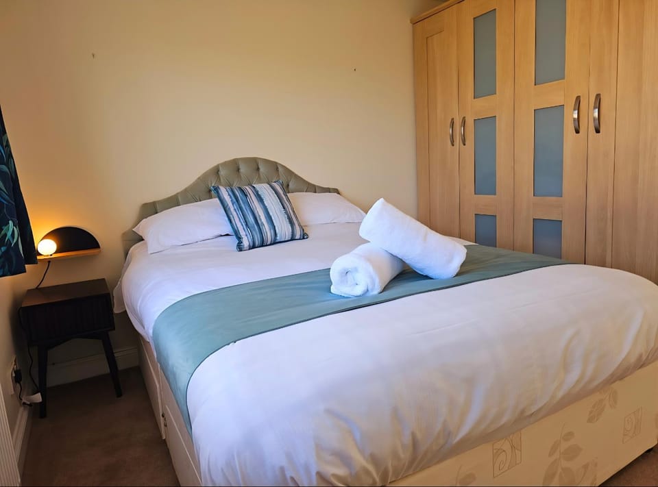 Bed, Photo of the whole room, Bedroom, towels, wardrobe