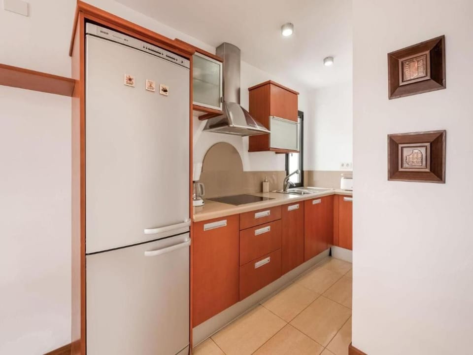 Kitchen or kitchenette, dishwasher, stove