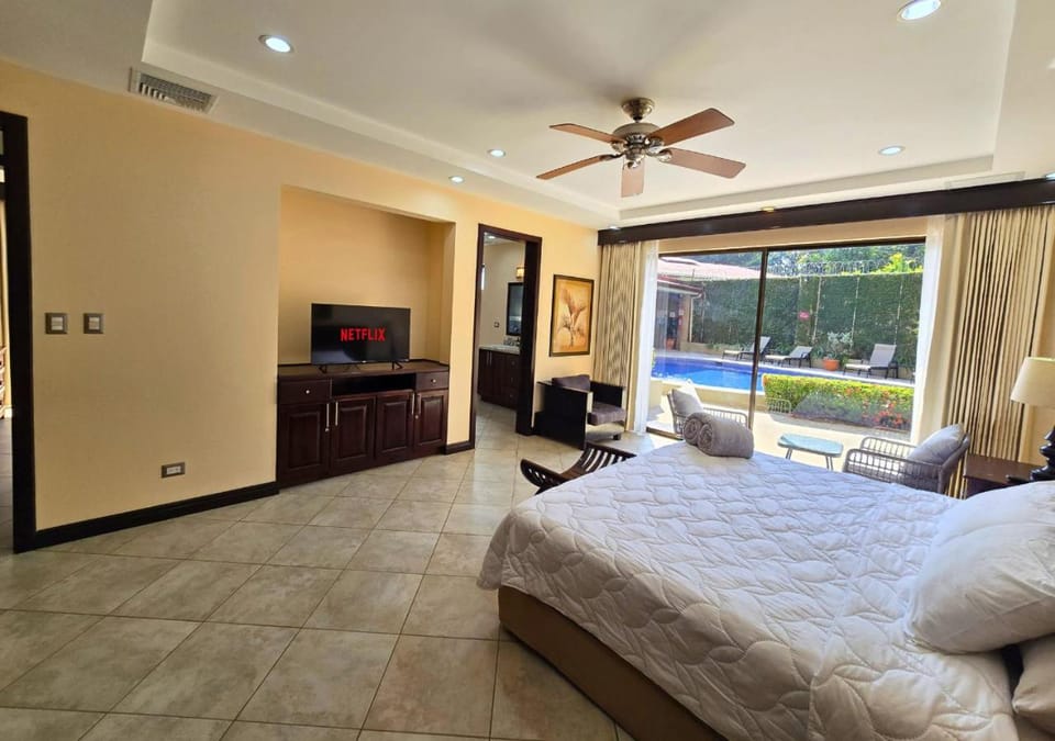 Bed, TV and multimedia, Bedroom, Pool view