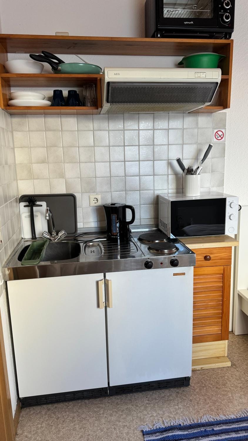 Kitchen or kitchenette, stove