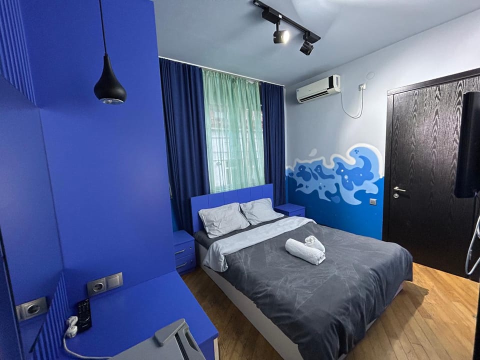 Bed, Bedroom, towels, wardrobe, air conditioner