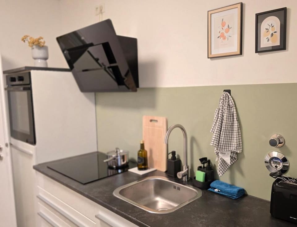 Kitchen or kitchenette, oven, stove