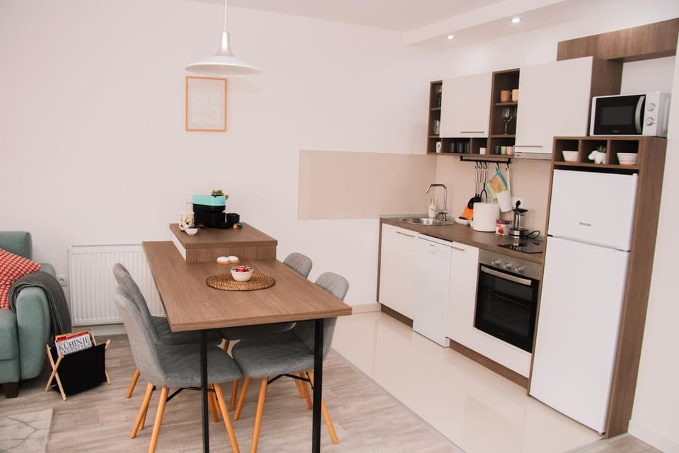 Kitchen or kitchenette, Seating area, Dining area, dishwasher, oven, stove