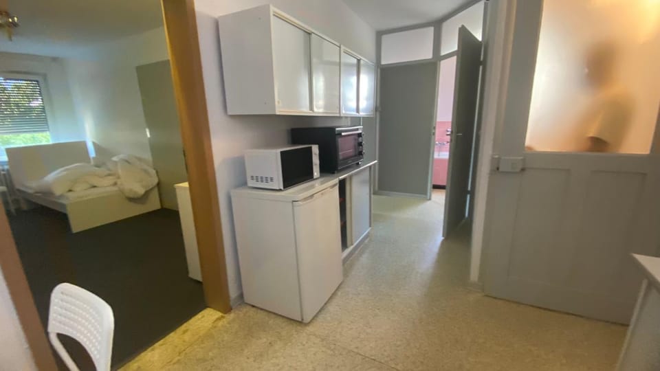 Kitchen or kitchenette, oven, stove