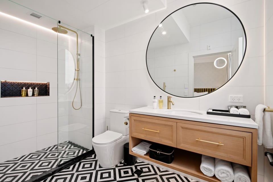 Shower, Toilet, Bathroom, hair dryier, towels