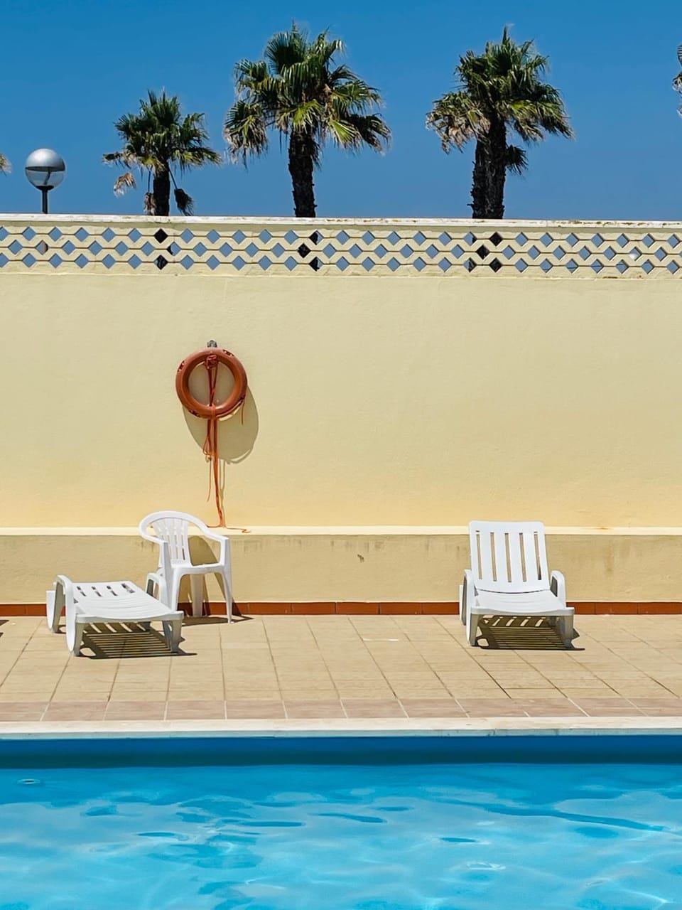 Swimming pool, sunbed