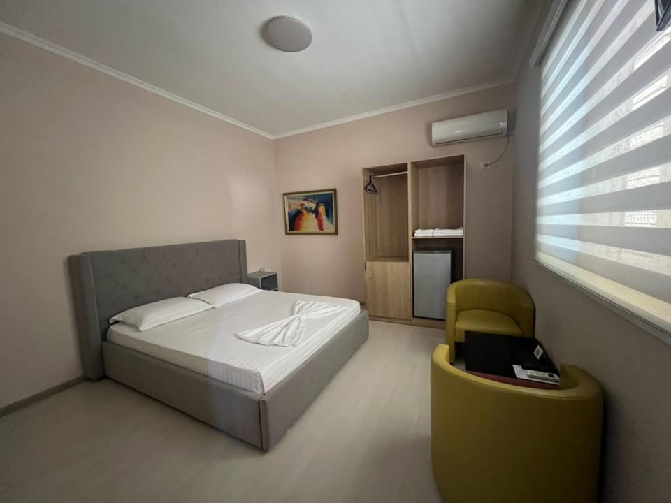 Bed, air conditioner