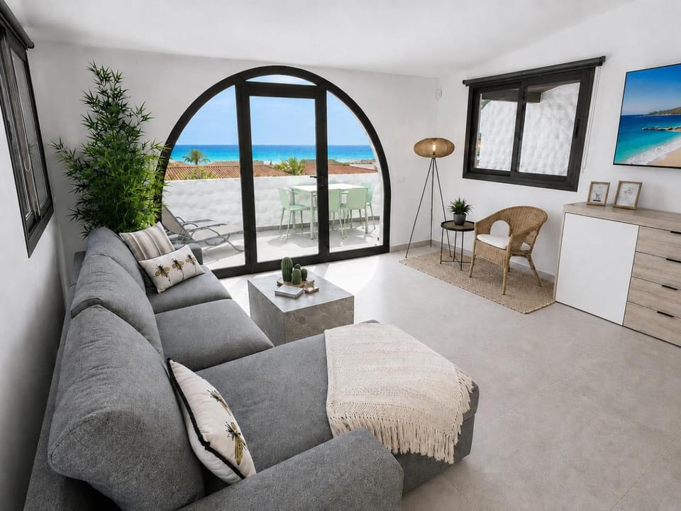 View (from property/room), Balcony/Terrace, Living room, Seating area, Sea view