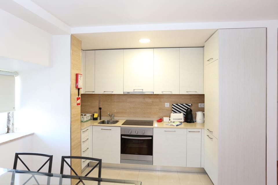 Kitchen or kitchenette, Dining area, dishwasher, oven, stove, toaster