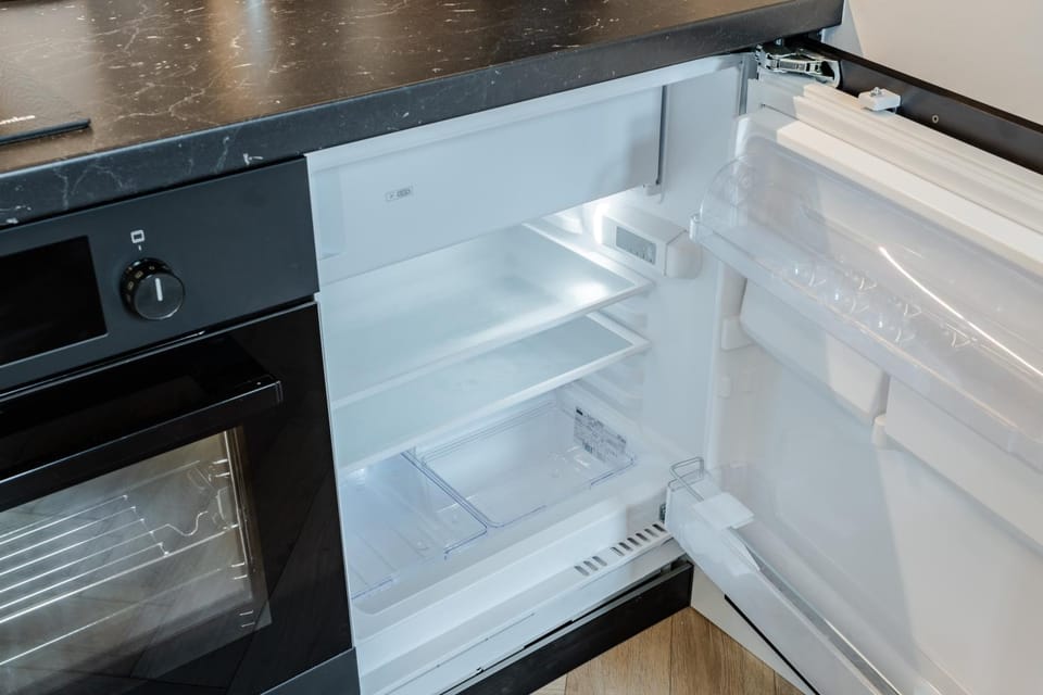 Kitchen or kitchenette, oven