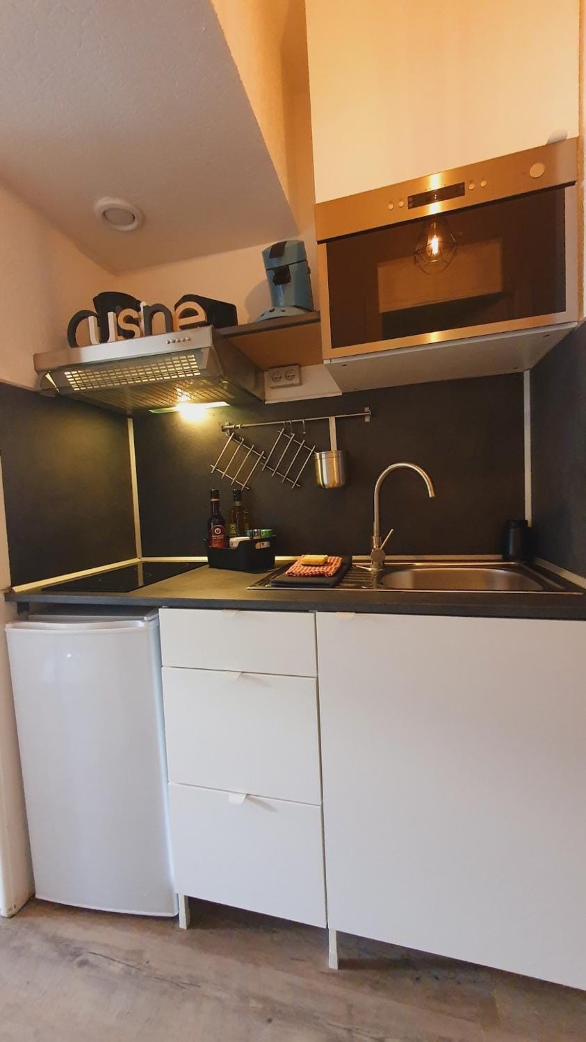 Kitchen or kitchenette, stove