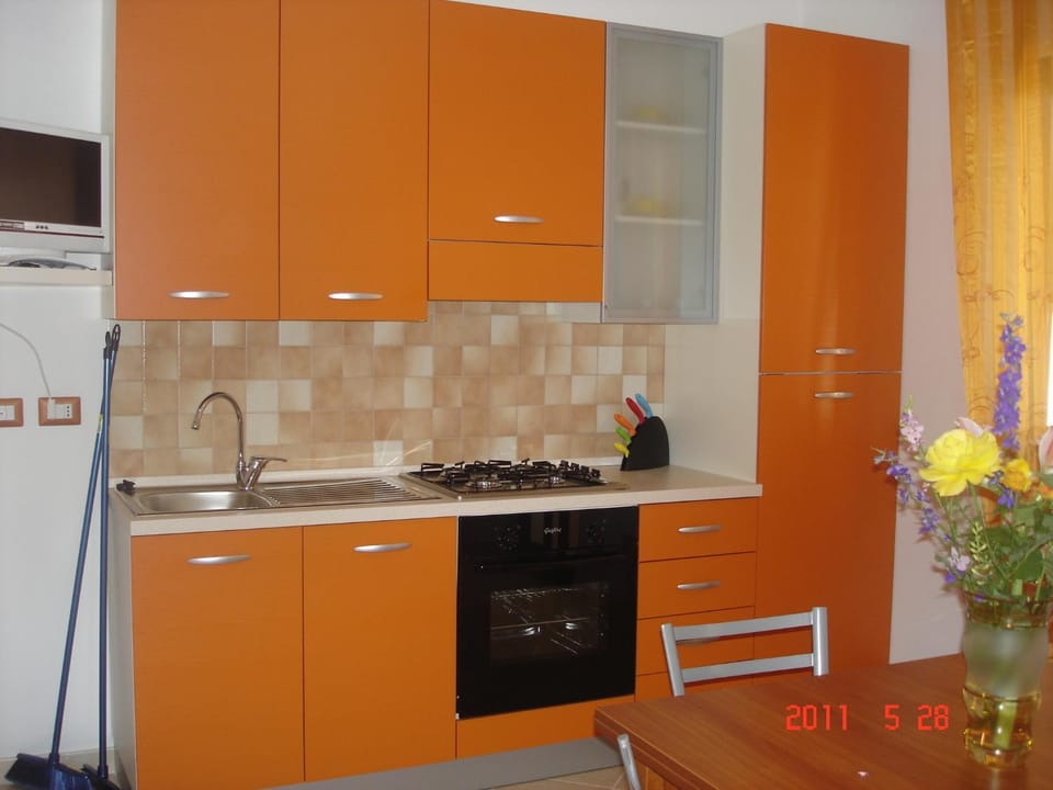 Kitchen or kitchenette, stove