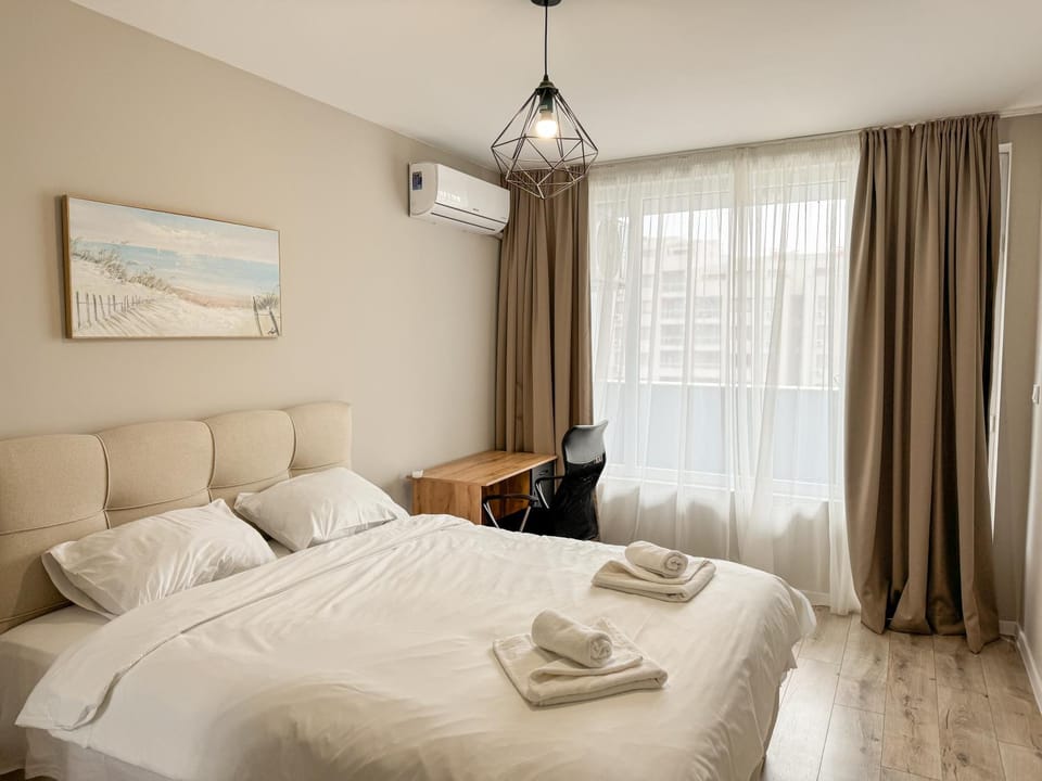 Bed, Seating area, Bedroom, towels, air conditioner