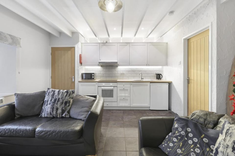 Kitchen or kitchenette, Living room, Seating area, oven, stove, toaster