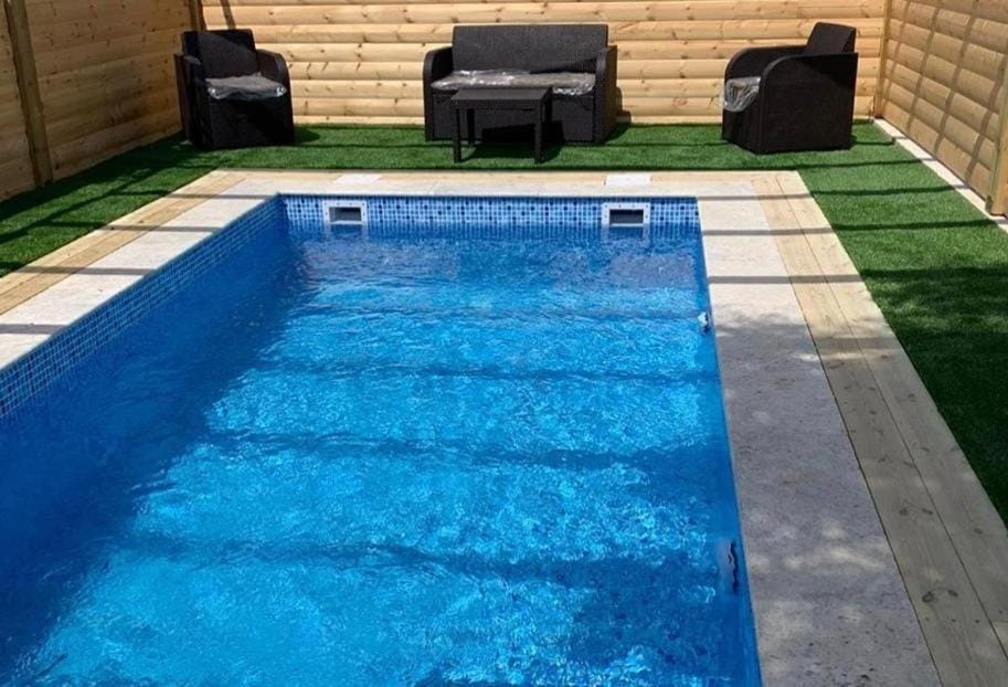 Swimming pool, sunbed
