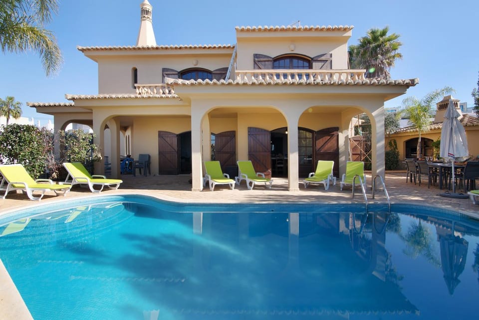 Property building, Living room, Swimming pool