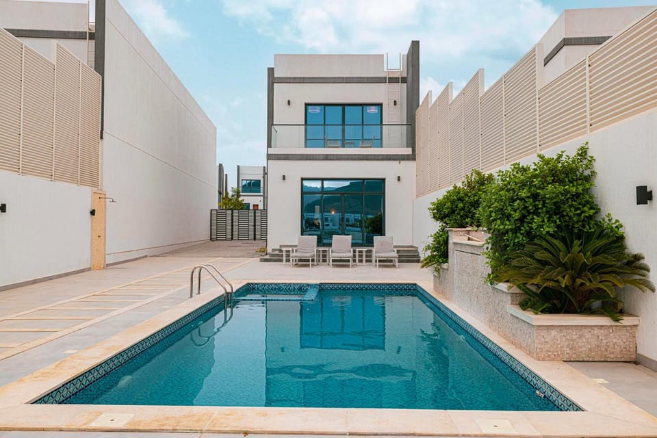 Property building, Patio, Day, Seating area, Pool view, Swimming pool, Swimming pool, Swimming pool, sunbed