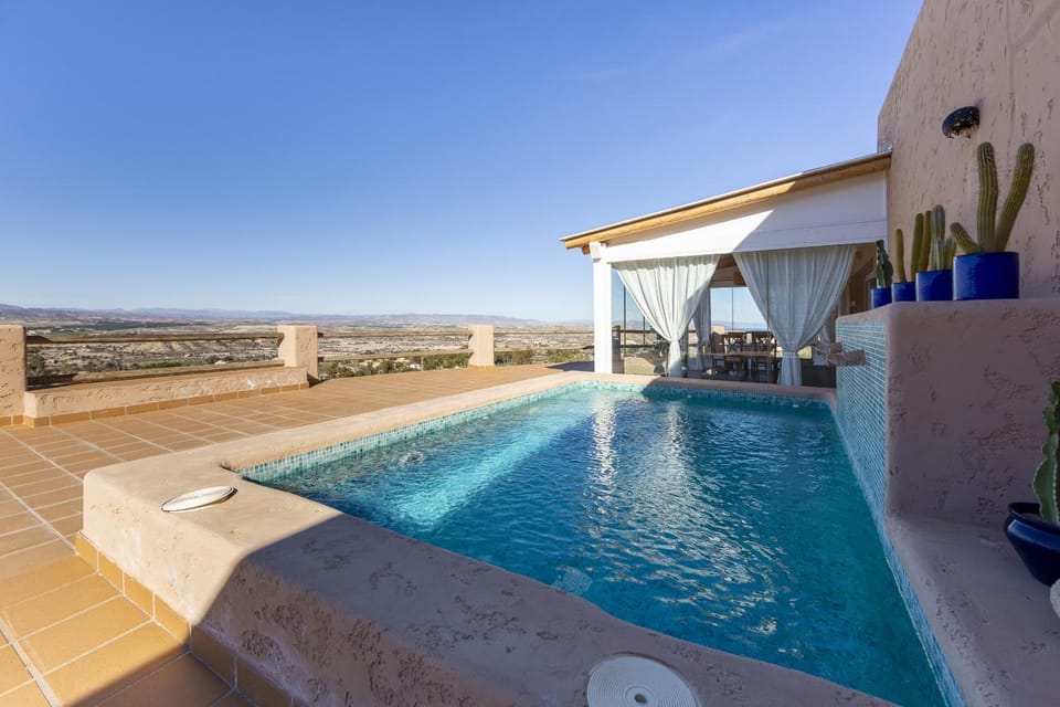 Property building, Patio, Day, Natural landscape, View (from property/room), Balcony/Terrace, Swimming pool, Swimming pool